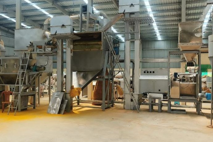 Interior of the Sangli processing facility with cleaning, polishing and destoning lines